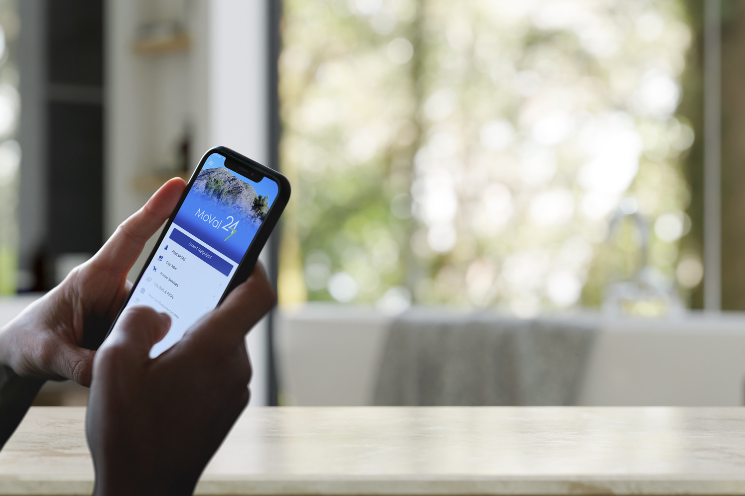 the MoVal app on a smart phone