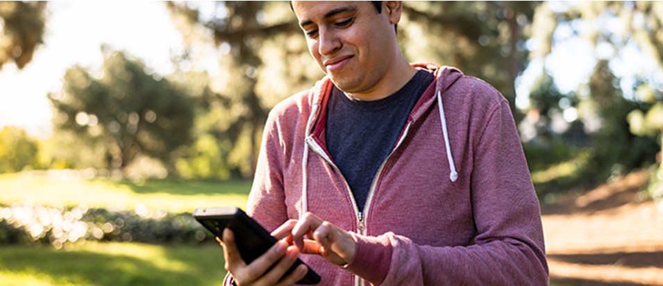 A man using a mobile phone.